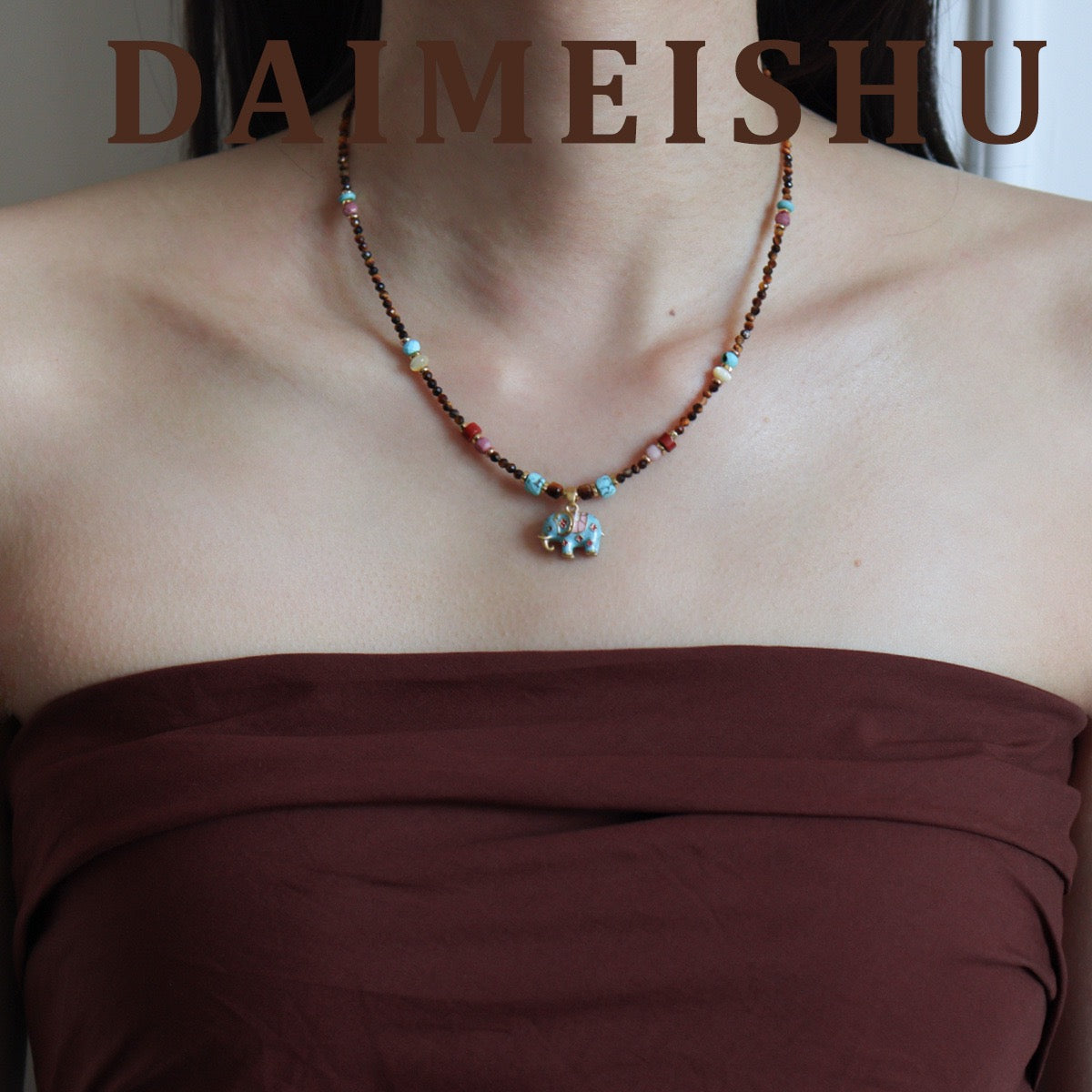 Model wearing Vintage Enamel Lucky Elephant Beaded Necklace