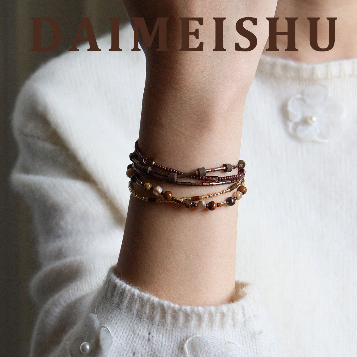 Model wearing Bohemian Multi-Strand Layered Beaded Cord Bracelet on wrist
