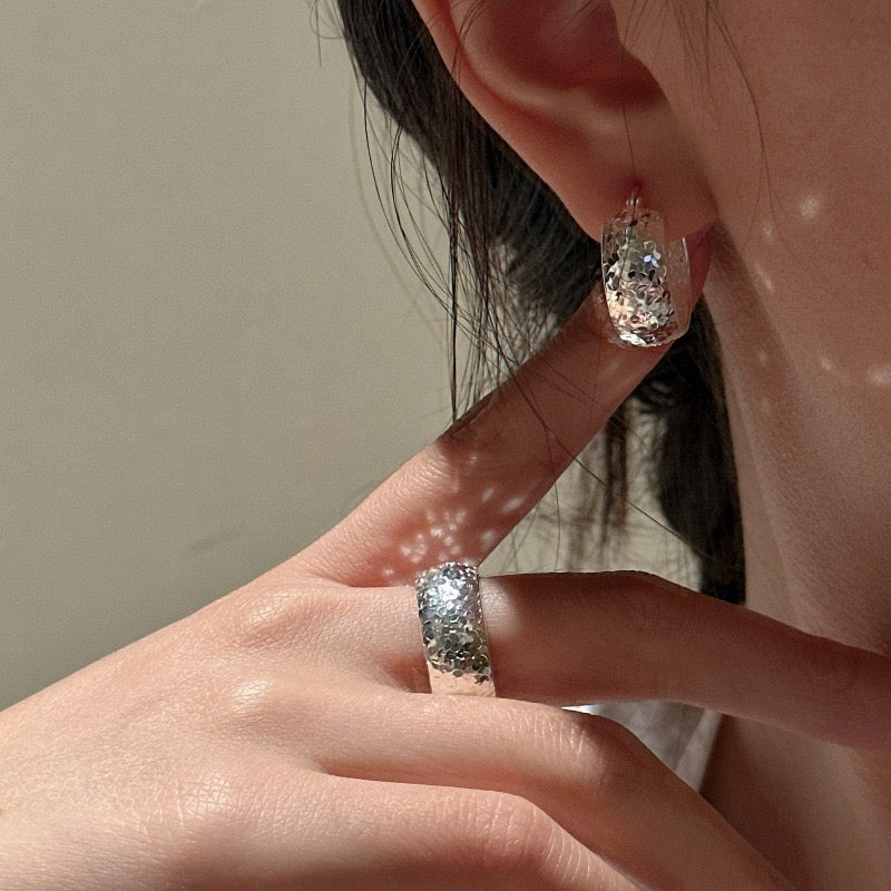 Model wearing S925 Crushed Ice Earring and Matching Faceted Band Ring