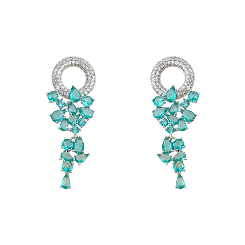 Vintage French Baroque green crystal waterfall tassel chandelier earrings on white background
